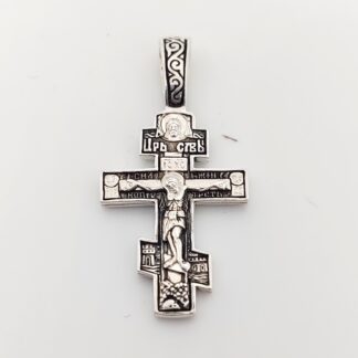 Russian 3 bar Silver Cross with dark background
