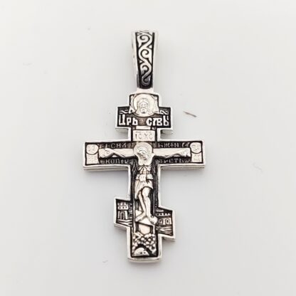 Russian 3 bar Silver Cross with dark background